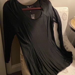 Black long sleeve tee/top NWT. Basic black can be worn alone or layered. Medium